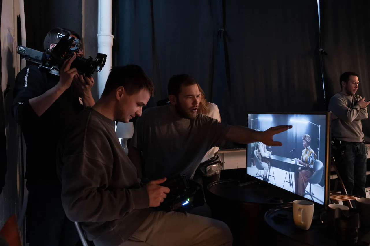 A creative agency team reviewing video work together